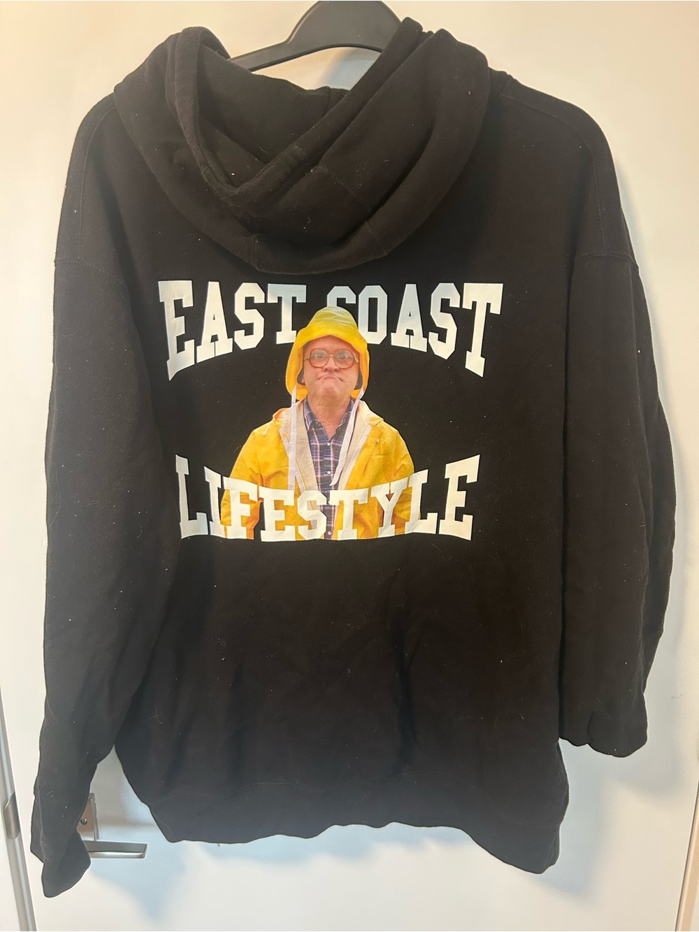 East Coast Lifestyle Men's Black Graphic Hoodie with Yellow Print